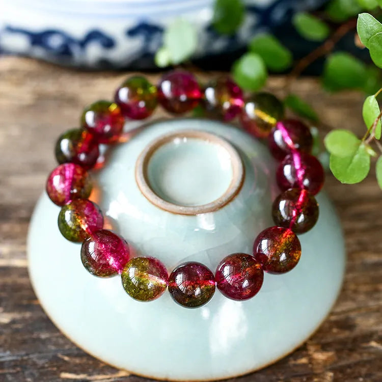 Handmade watermelon crystal women's bracelet showing pastoral design in four diameter sizes