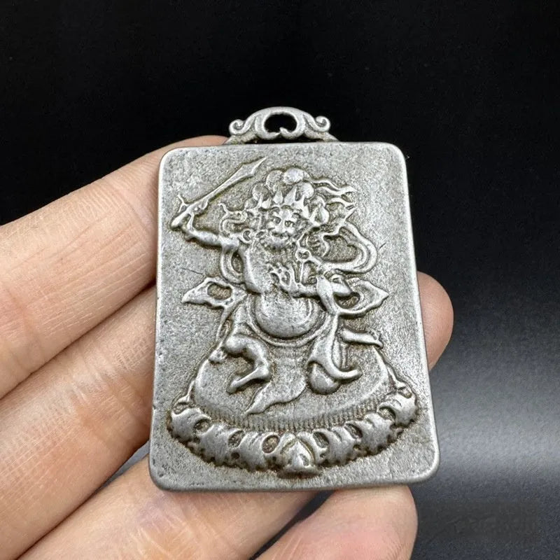Iron pendant with Chinese geometric style and Aryaacalanatha Yamantaka design for wall hanging.