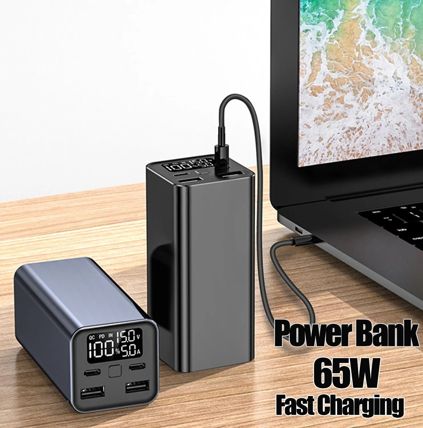 Black high power 65W metal laptop charging bank showing size and ports.