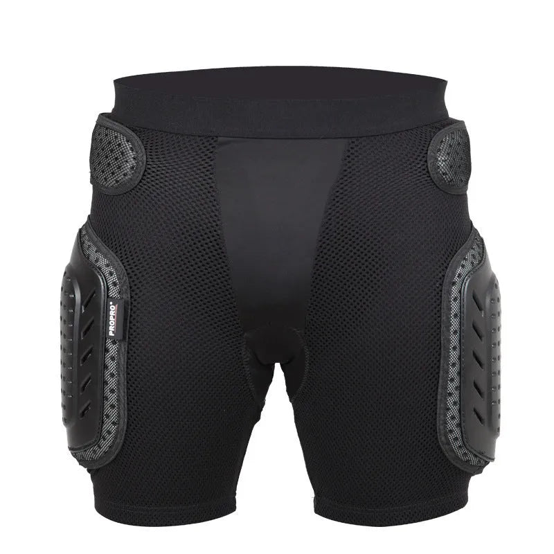 Black cycling hip protection pants showing padded construction for impact safety during mountain biking.