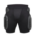 Black cycling hip protection pants showing padded construction for impact safety during mountain biking.