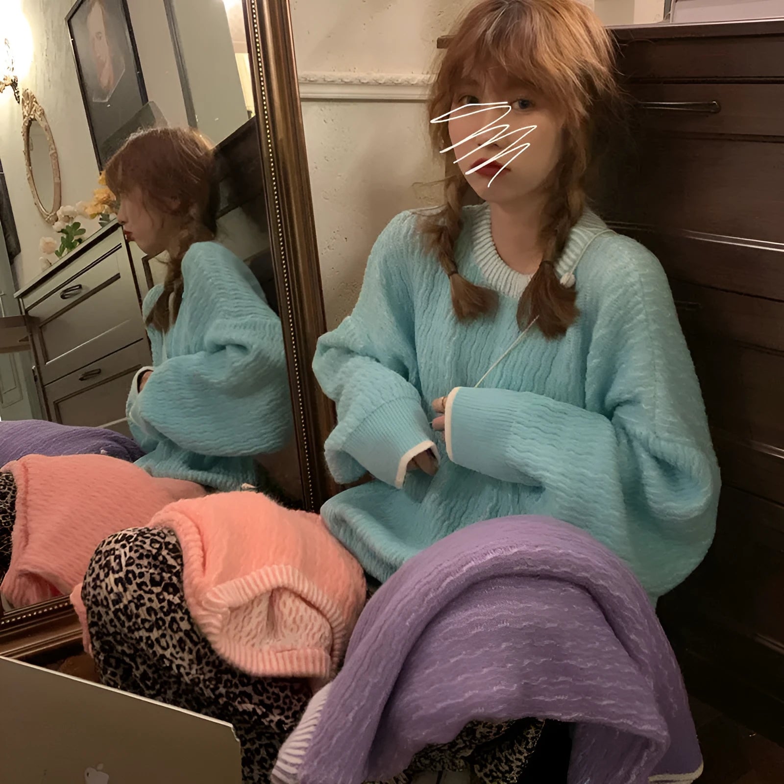 Women's loose fit pullover sweater in a solid colour, shown in lake blue, with regular sleeves.