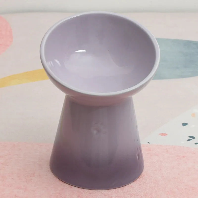 Ceramic pet bowl with anti-tumble design and raised chin support for cats and dogs