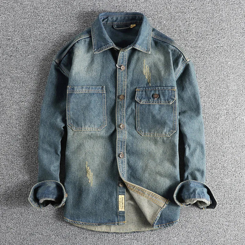Men's vintage denim shirt in light blue washed cotton with loose fit and long sleeves
