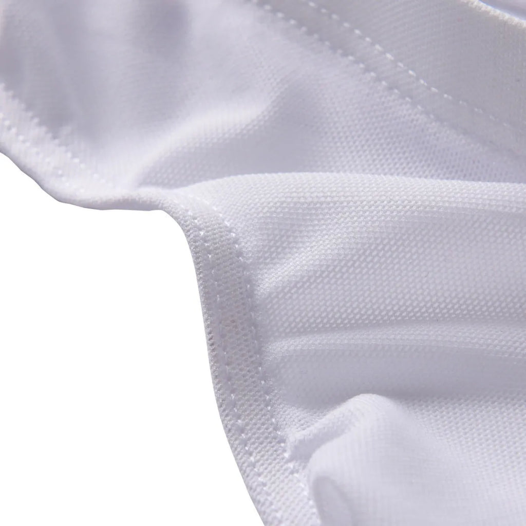 Men's black quick-dry nylon low waist triangle brief fashion shorts laid flat