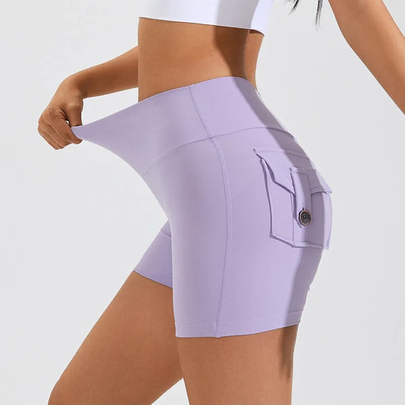 Women's high-waisted fitness shorts with pockets in various solid colours