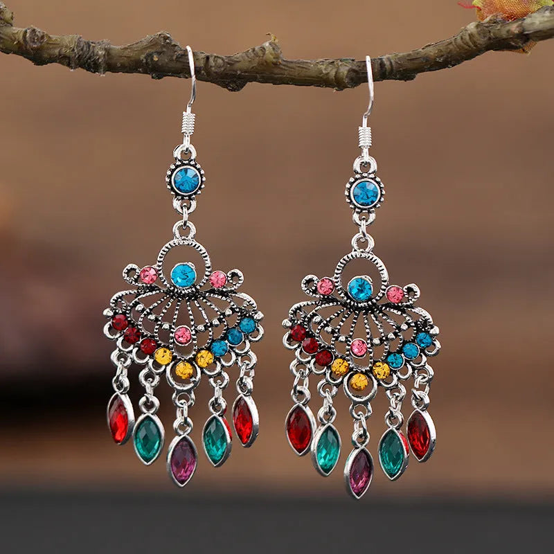 Purple retro drop earrings with dangling crystal fringe elements and ethnic style detailing