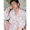 Pink loose fit women's floral shirt with embossed long sleeve pattern