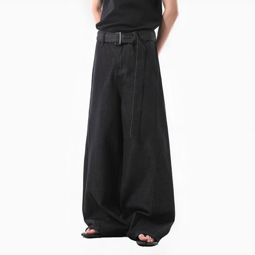 Black high-waist straight-leg denim jeans on a neutral background.