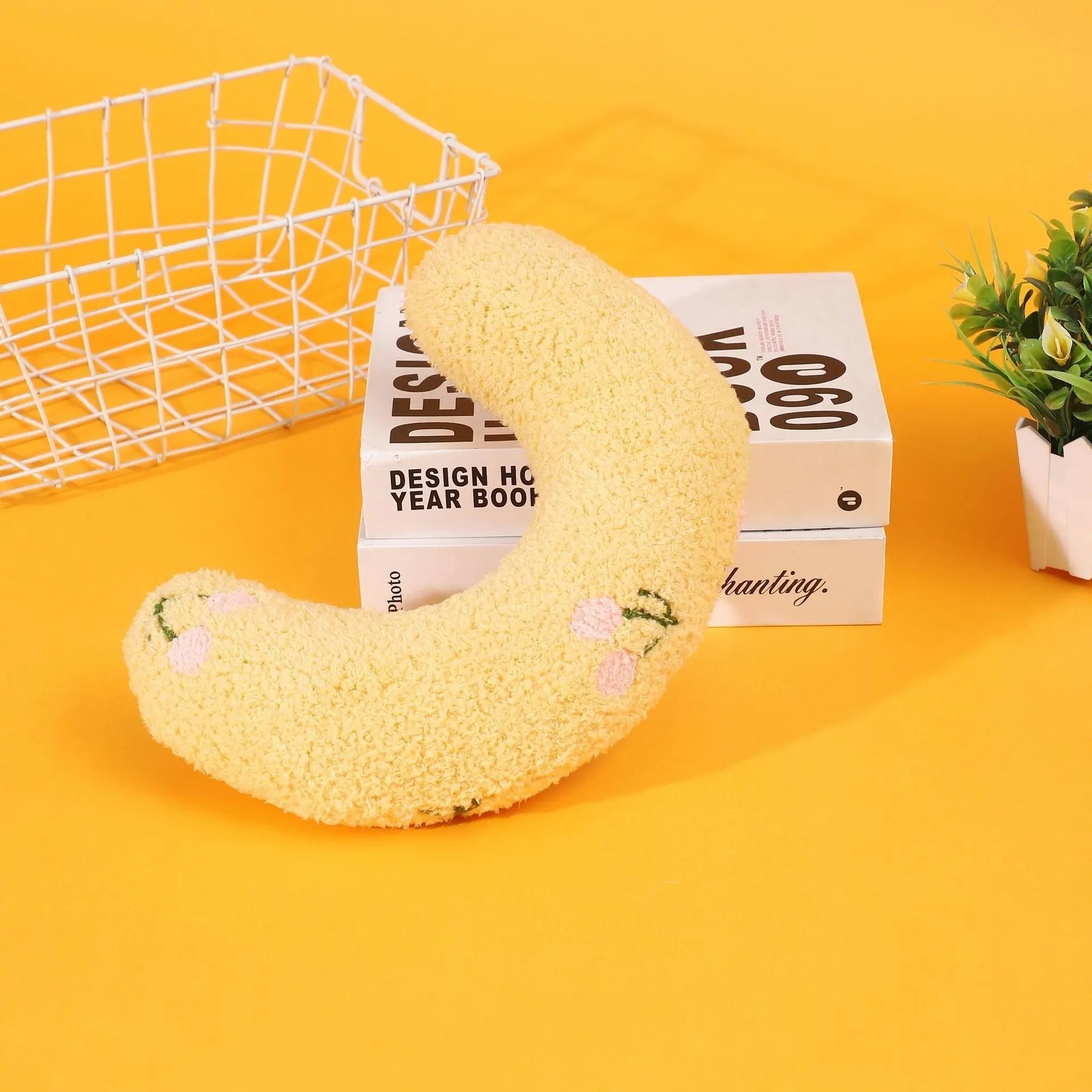 Half moon U-shaped cloth pillow for dogs and cats in blue, pink, white, or yellow