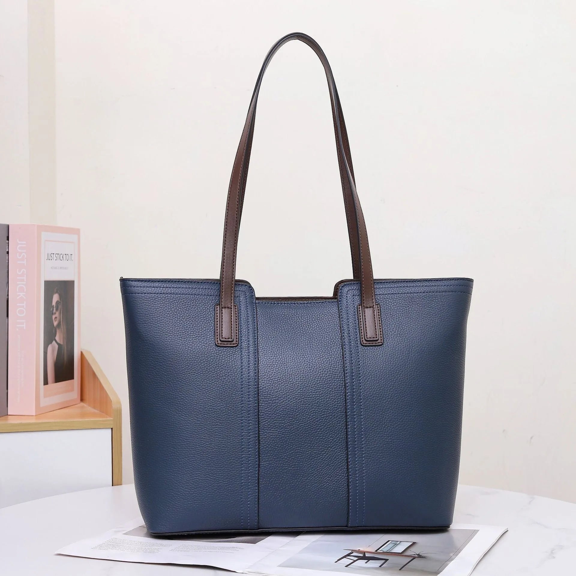 Genuine leather women's commuter shoulder bag in box-type shape with sewing line detailing and mobile phone compartment