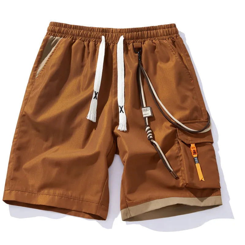 Man wearing loose-fit, high-waisted, cropped sports shorts in bamboo fibre.