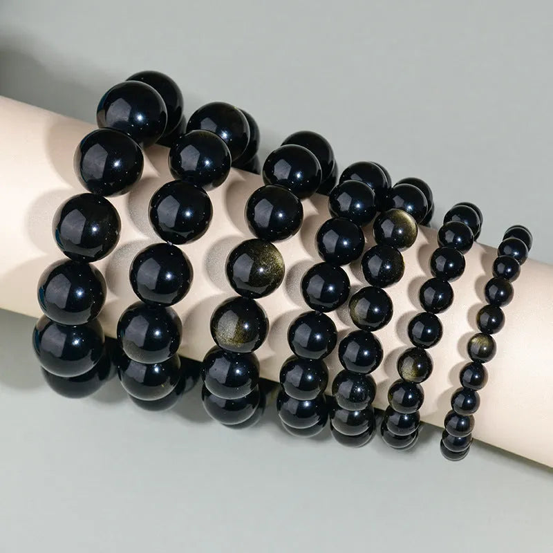 Hand-woven obsidian couple bracelet set with crystal beads in ethnic style design