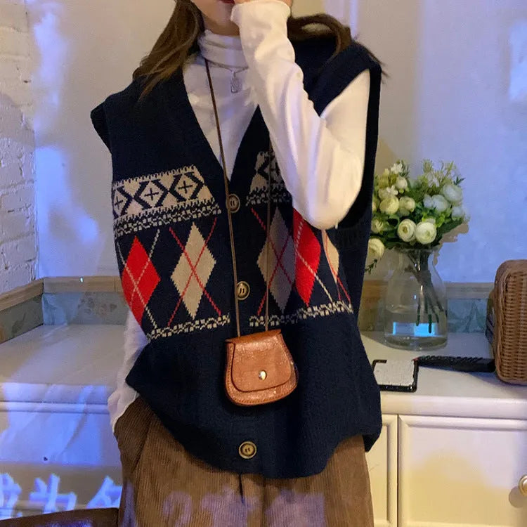 Loose-fit sleeveless cardigan with diamond plaid pattern in khaki, shown front view