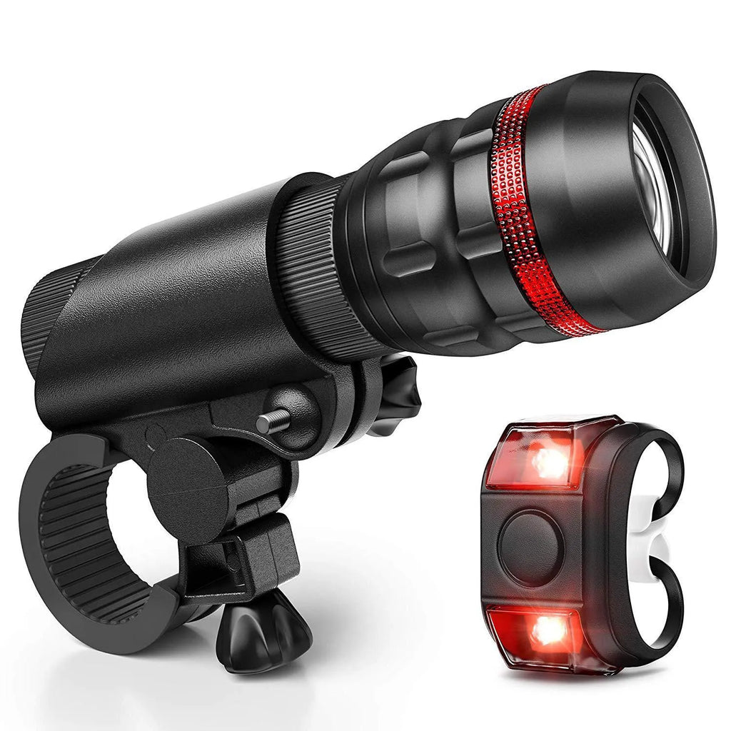 Bicycle safety light set showing front flashlight with mounting bracket and separate red taillight