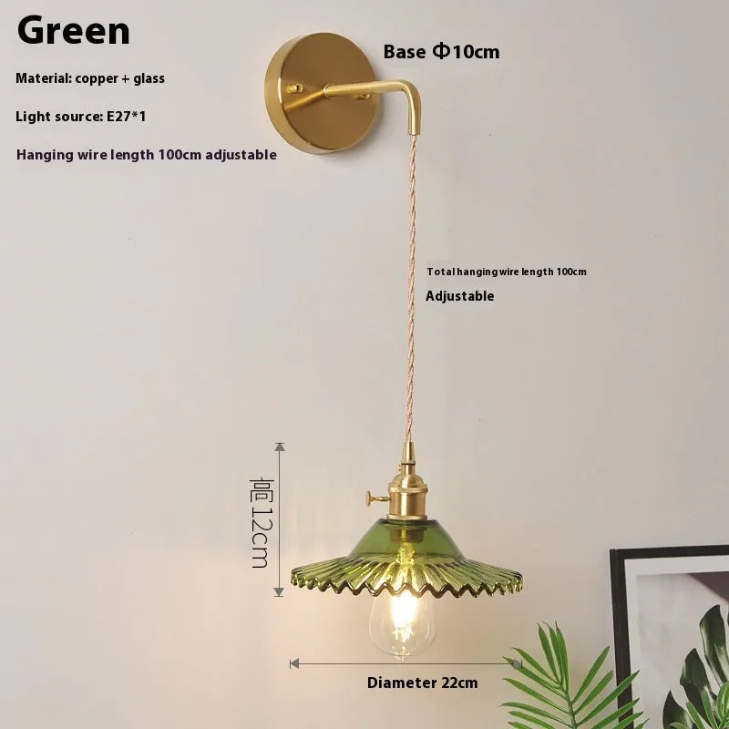 Copper retro lotus wall lamp with glass shade in amber colour variation