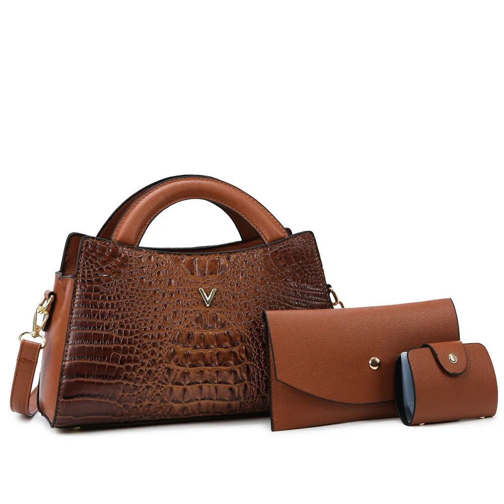 Women's black crocodile pattern PU leather crossbody bag showing internal phone and document pockets.