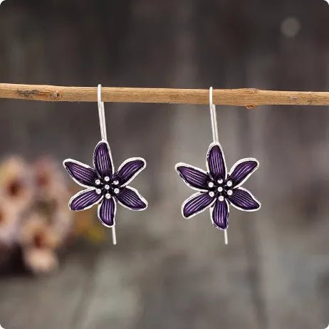 Purple flower shaped alloy earrings with electroplated finish retro design