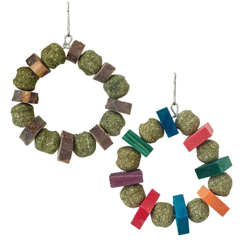 Applewood and woven straw ball chew ring toy for small pets on a white background.