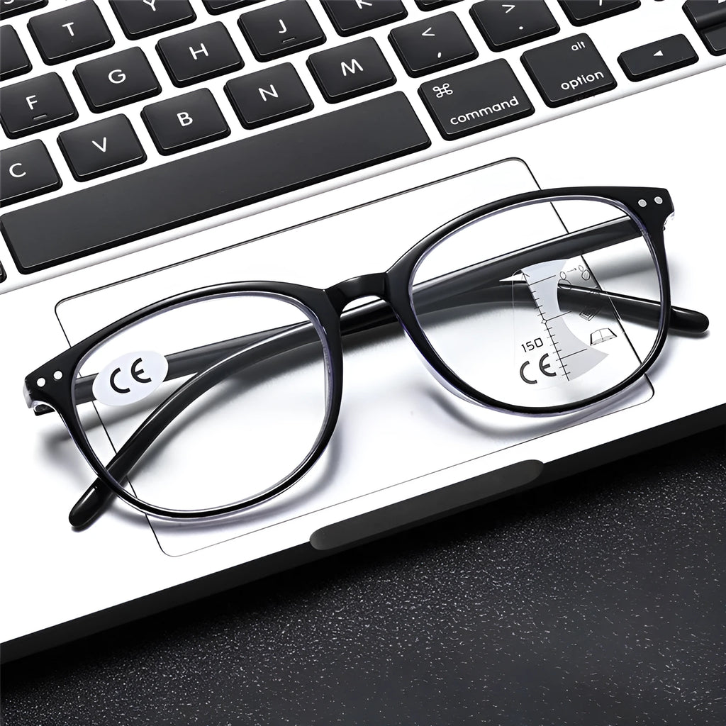 A pair of women's ultra-light multi-focus presbyopic glasses with a choice of frame colours on a plain background.