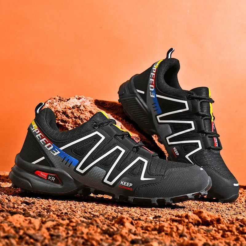 Men's low-top casual running shoe in synthetic leather with mesh lining, shown in grey orange colourway.