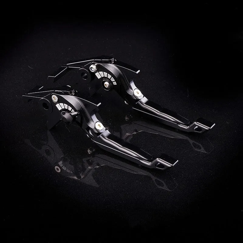 Pair of anodised metal motorcycle brake and clutch levers with adjustable length mechanism
