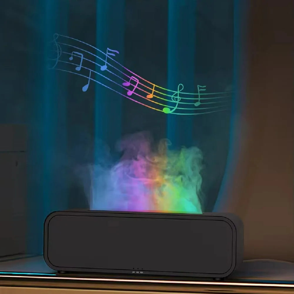 Black and white aroma diffuser with dynamic flame LED light effect on a table.