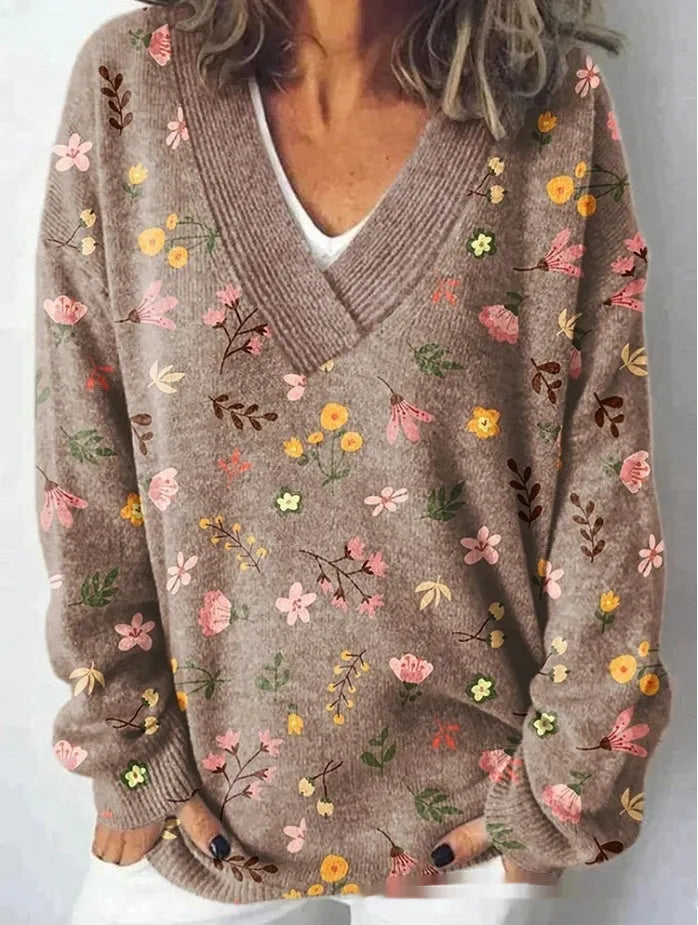 Women's V-neck floral print sweatshirt with long sleeves in wool woven fabric.