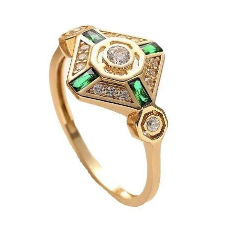 Women's square geometric fashion ring with a green emerald-coloured stone on an electroplated band.