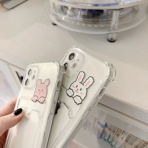 Cartoon design transparent TPU iPhone case with built-in card holder slot on the back.