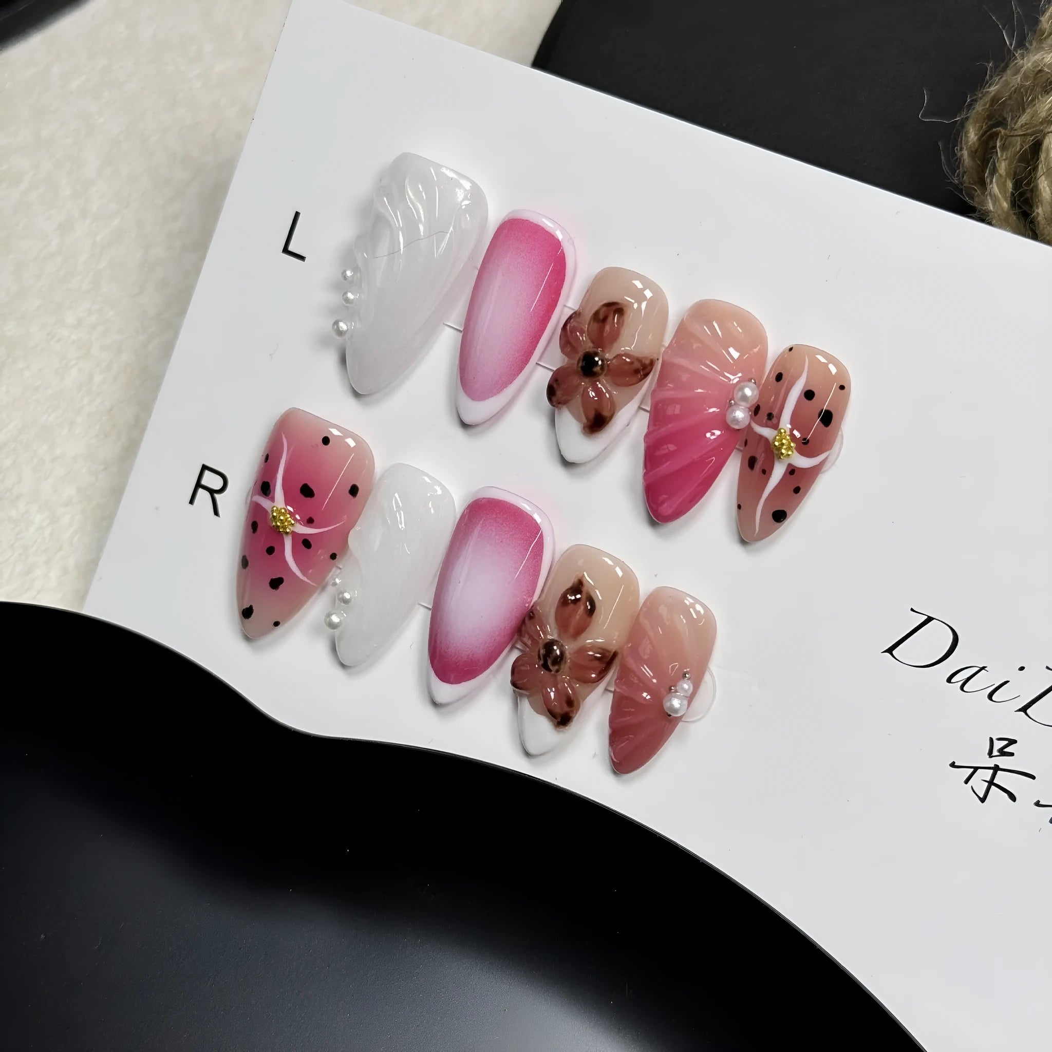 Set of hand-painted 3D carved nail beauty patches in embossed cute patterns.