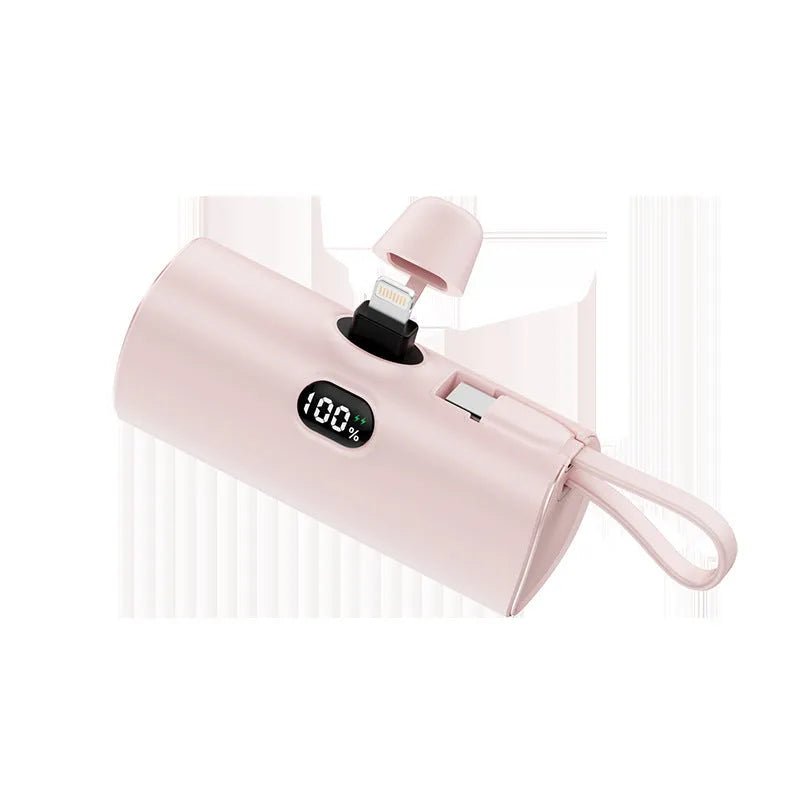 Compact rectangular power bank with digital display, showing colour options: black, white, pink, blue, green.