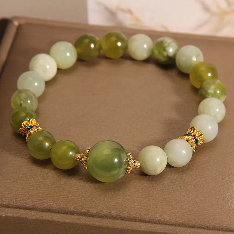 Women's bracelet made from green Xiuyan jade with original light luxury sweet mori design.
