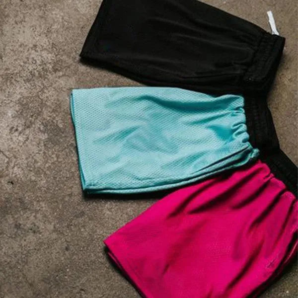Men's solid colour mesh quick-drying shorts for running and fitness training in summer.