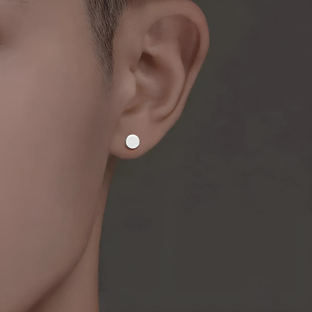 Sterling silver S999 flat ear bone studs in round geometry shape showing silver and black colour options
