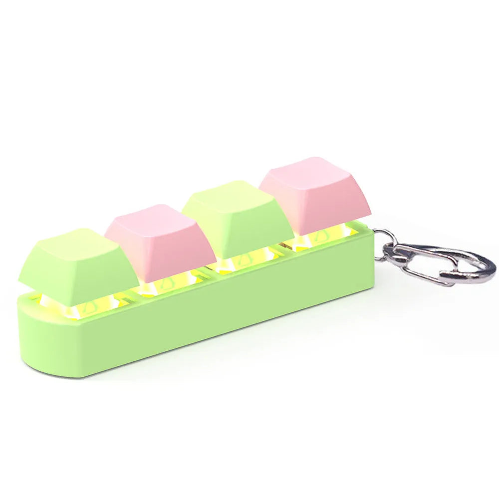 4-key mechanical keyboard switch tester with transparent bottom shell on desk