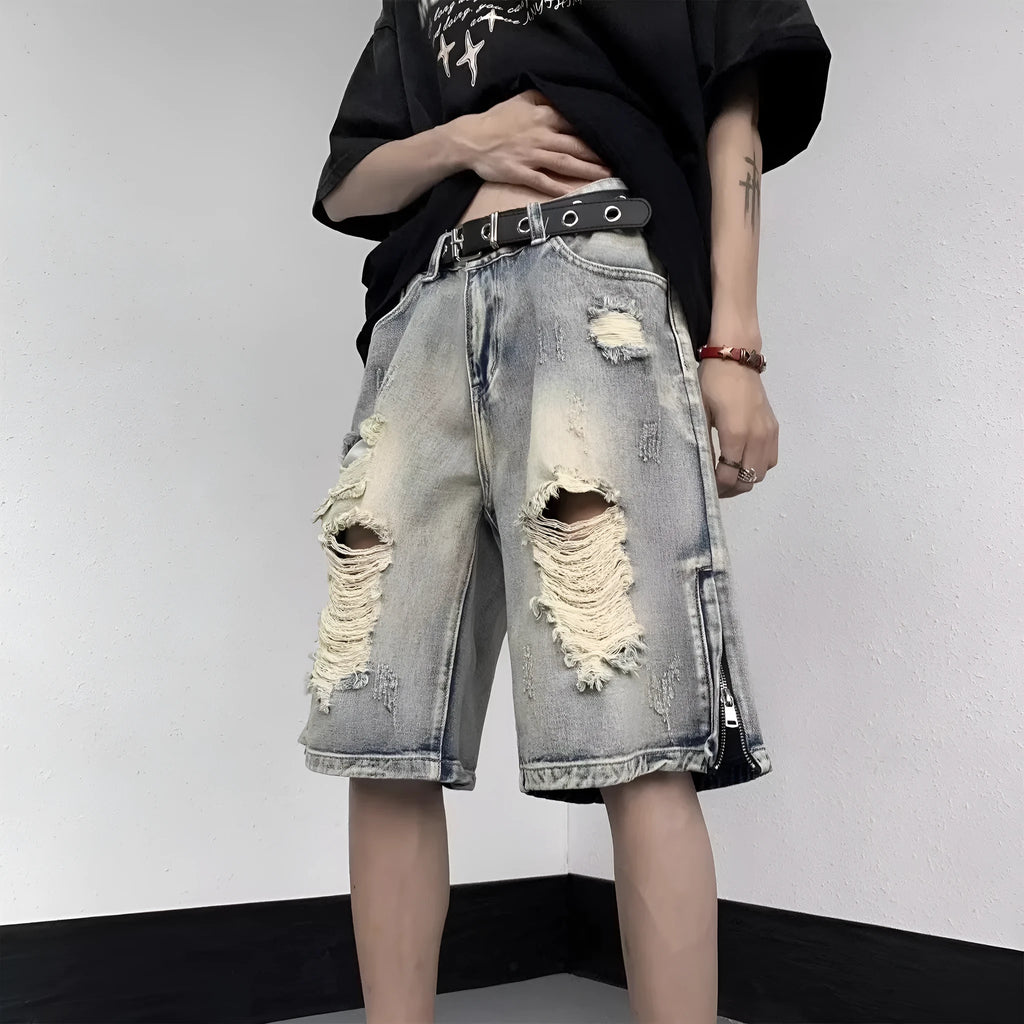 Blue retro denim shorts with wide-leg loose fit and tattered distressing details.