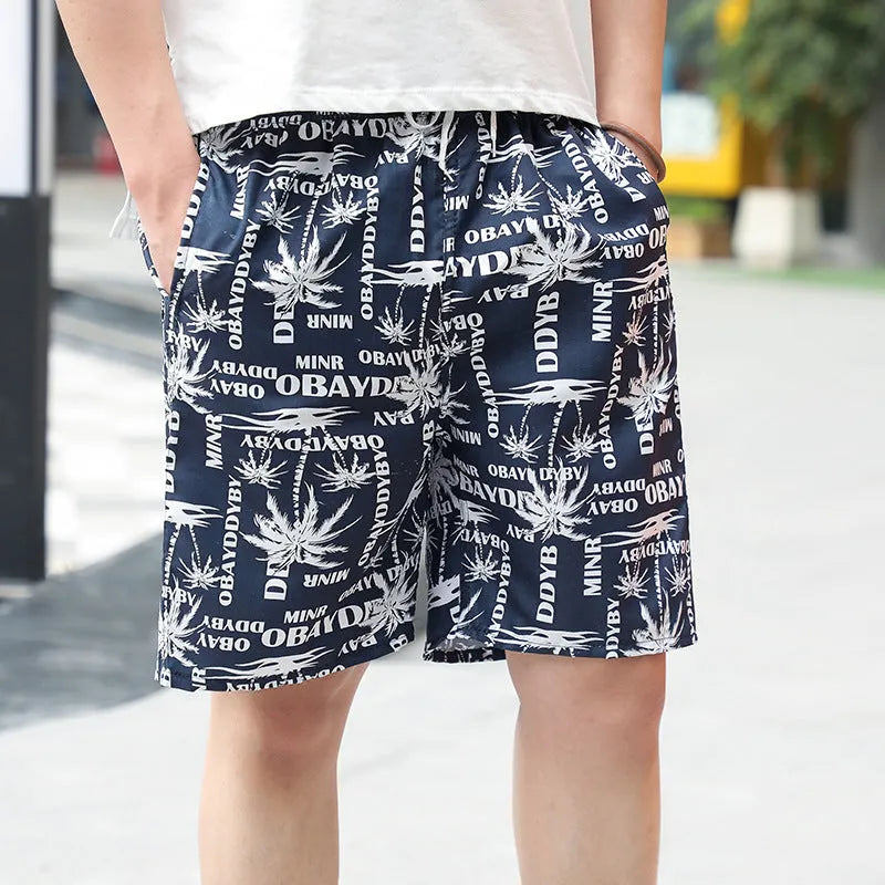 Men's floral print swimming trunks in multiple colour patterns with five-point design