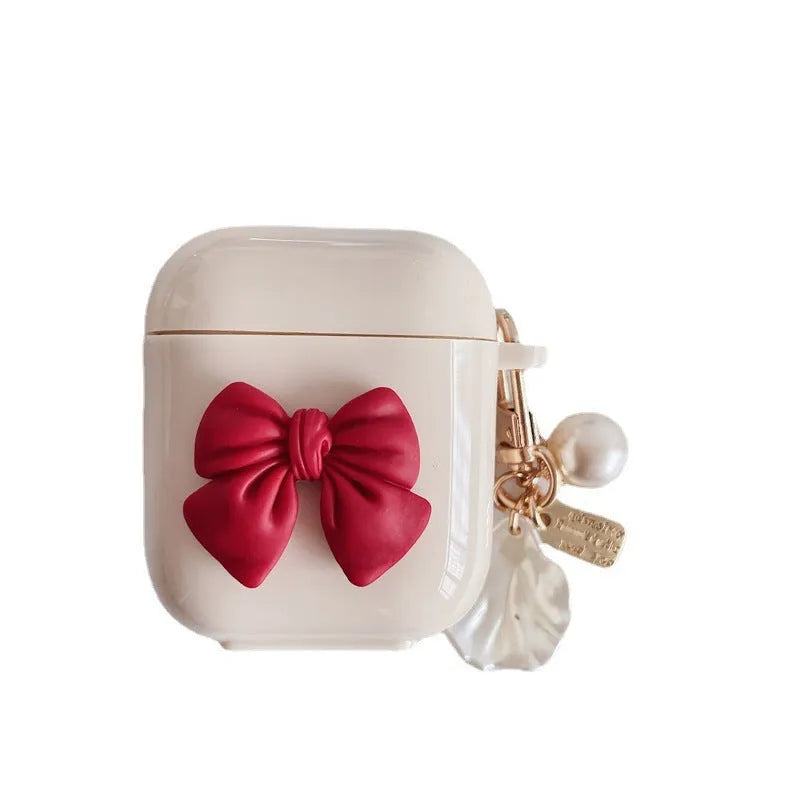 Beige red bow shell patterned TPU protective case for AirPods Pro and other models.