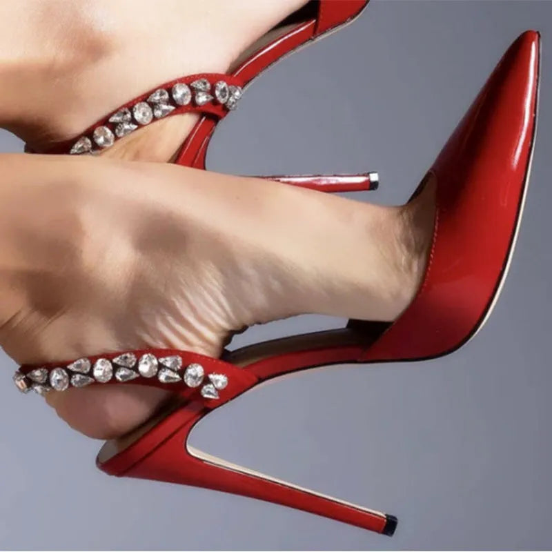 Women's black patent leather pointed toe high heel sandals with rhinestone details on the sides