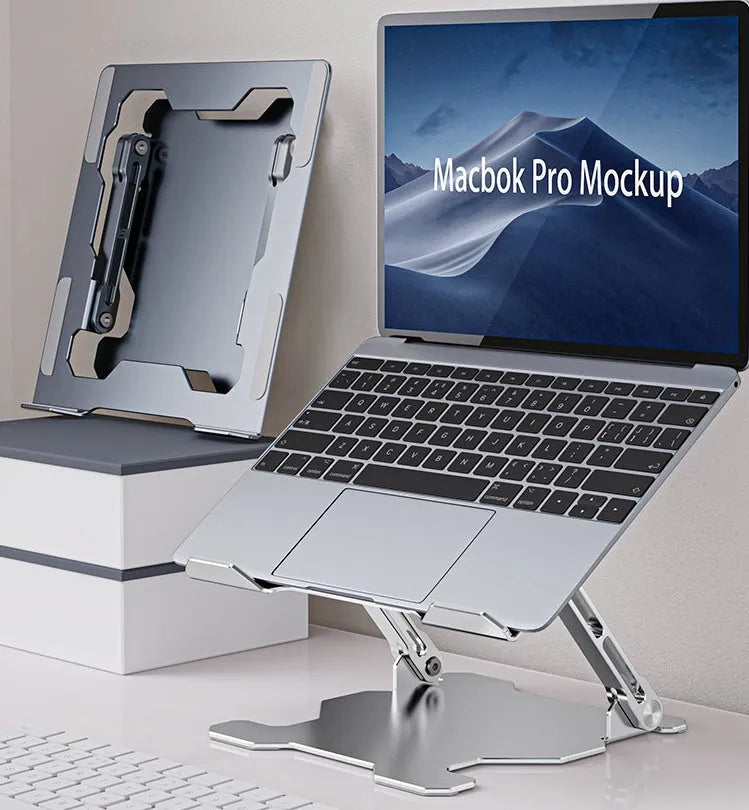 Grey aluminum laptop stand shown at an adjustable angle, folded flat, and holding a silver laptop.