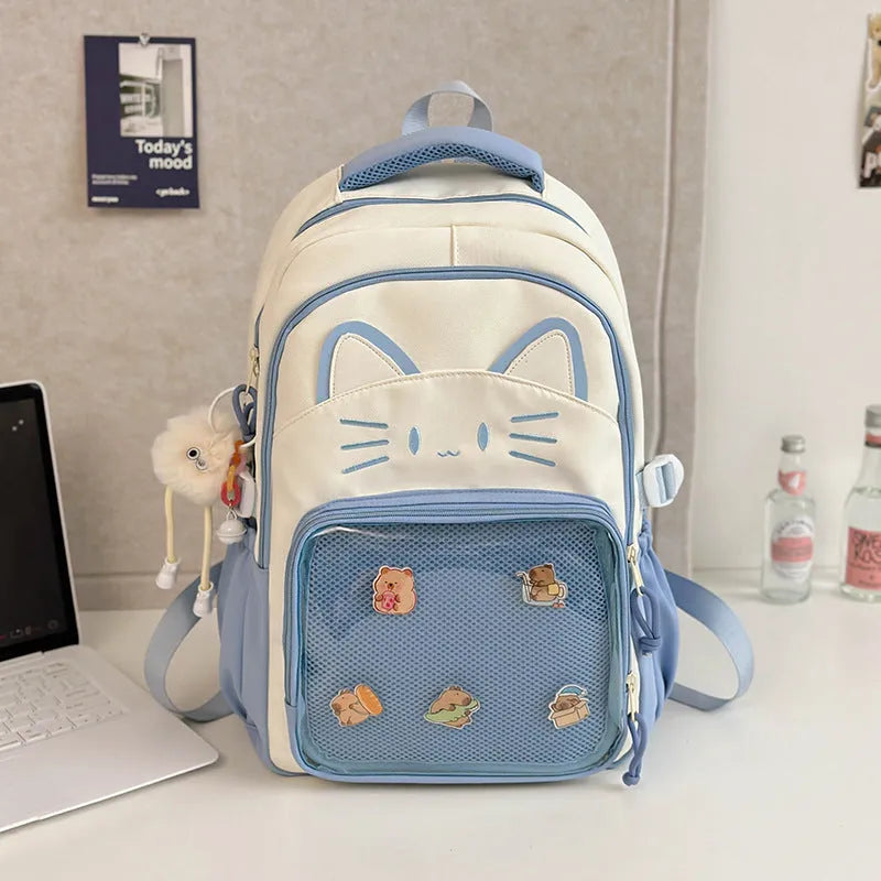 Korean cartoon large capacity nylon backpack in pink colour with badge pendant.