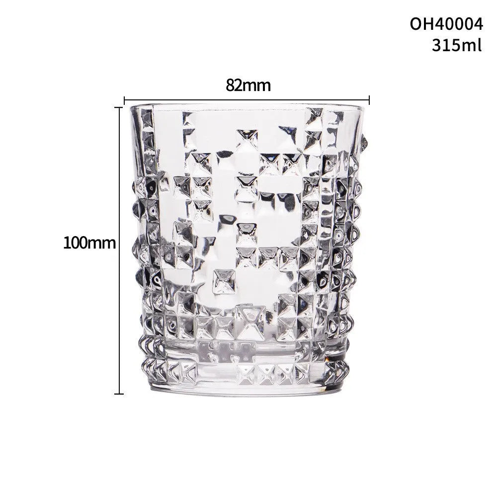 Crystal clear 330ml whiskey shot glass with a thick base, shown in an amber colour style.