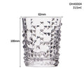 Crystal clear 330ml whiskey shot glass with a thick base, shown in an amber colour style.