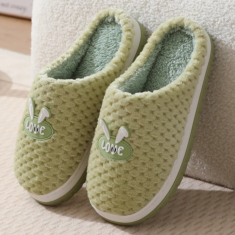 Women's rabbit plaid cotton house slippers with a thick rubber sole, shown in apricot colour.