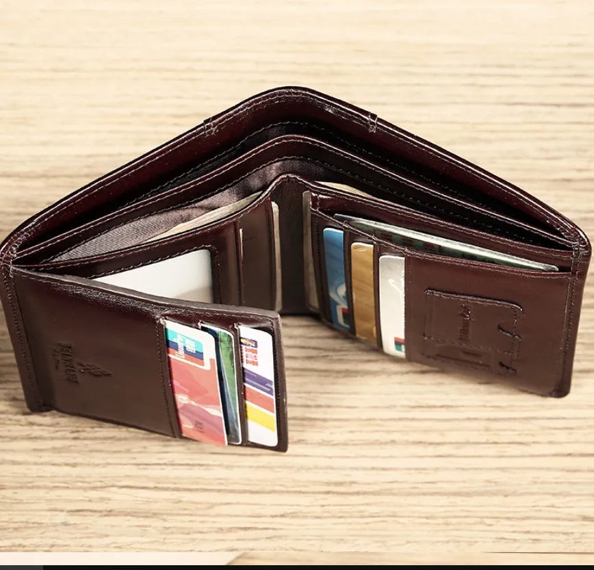 Men's leather wallet showing internal card slots, coin compartment, and document section