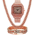 Women's Roman numeral quartz watch set with bracelet and necklace in gold, rose gold, or silver.