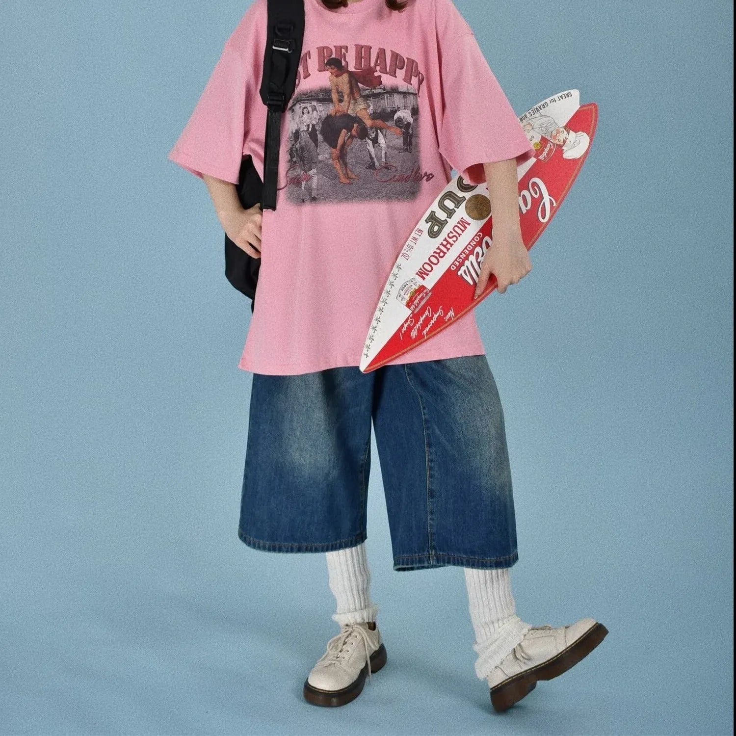 Men's loose-fit straight-leg denim shorts in blue, shown on a model for summer.