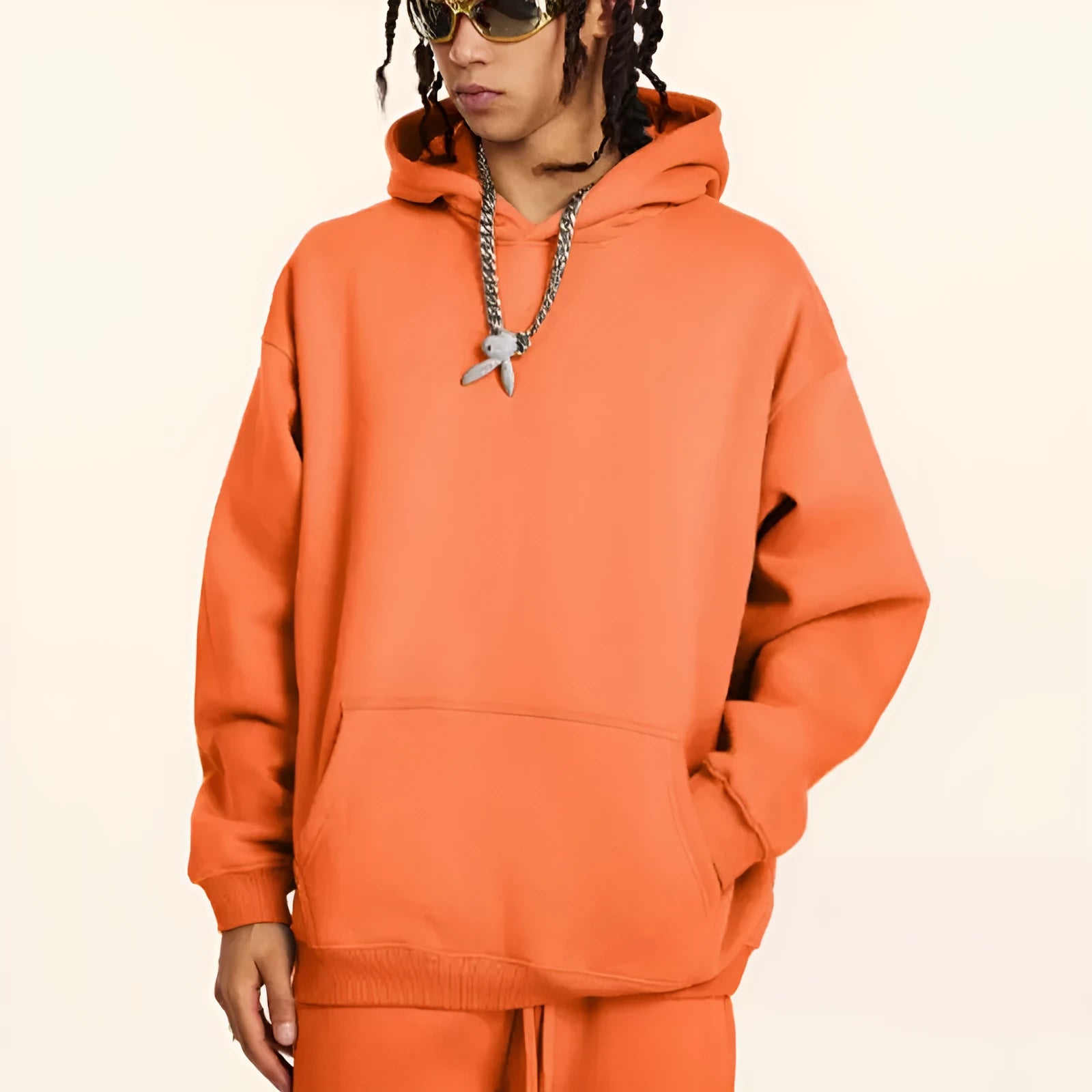 Men's cotton terry hooded pullover sweater in loose fit showing drop-shoulder sleeves and solid colour options