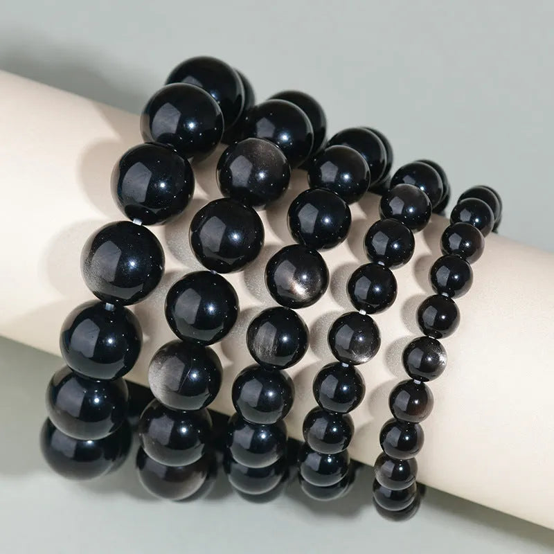 Hand-woven obsidian couple bracelet set with crystal beads in ethnic style design